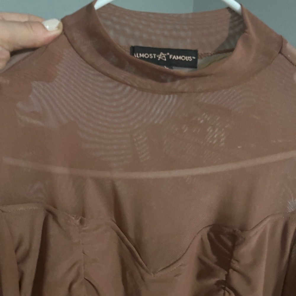 Beautiful blouse, size large with sharing on it